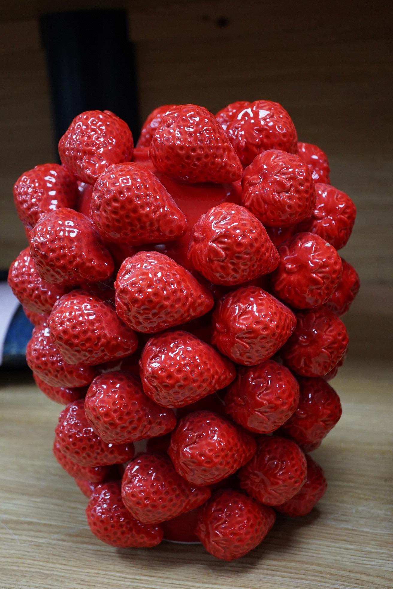 A pair of multi strawberry ceramic vases, 32cm high